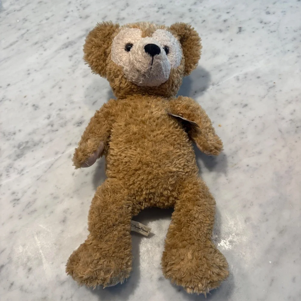 Preowned Disney Parks‎ Duffy the Disney Bear plush with original tag attached